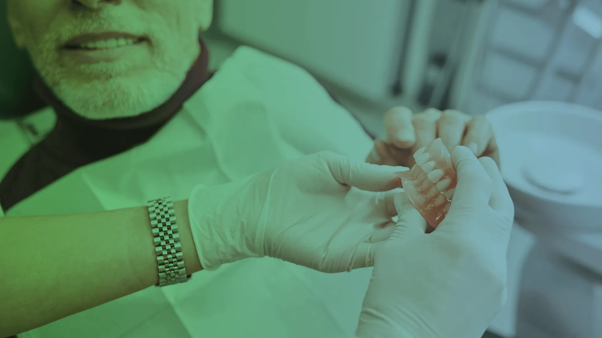 Dentist showing dentures.