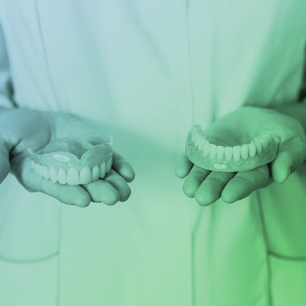 Dentist showing dentures.
